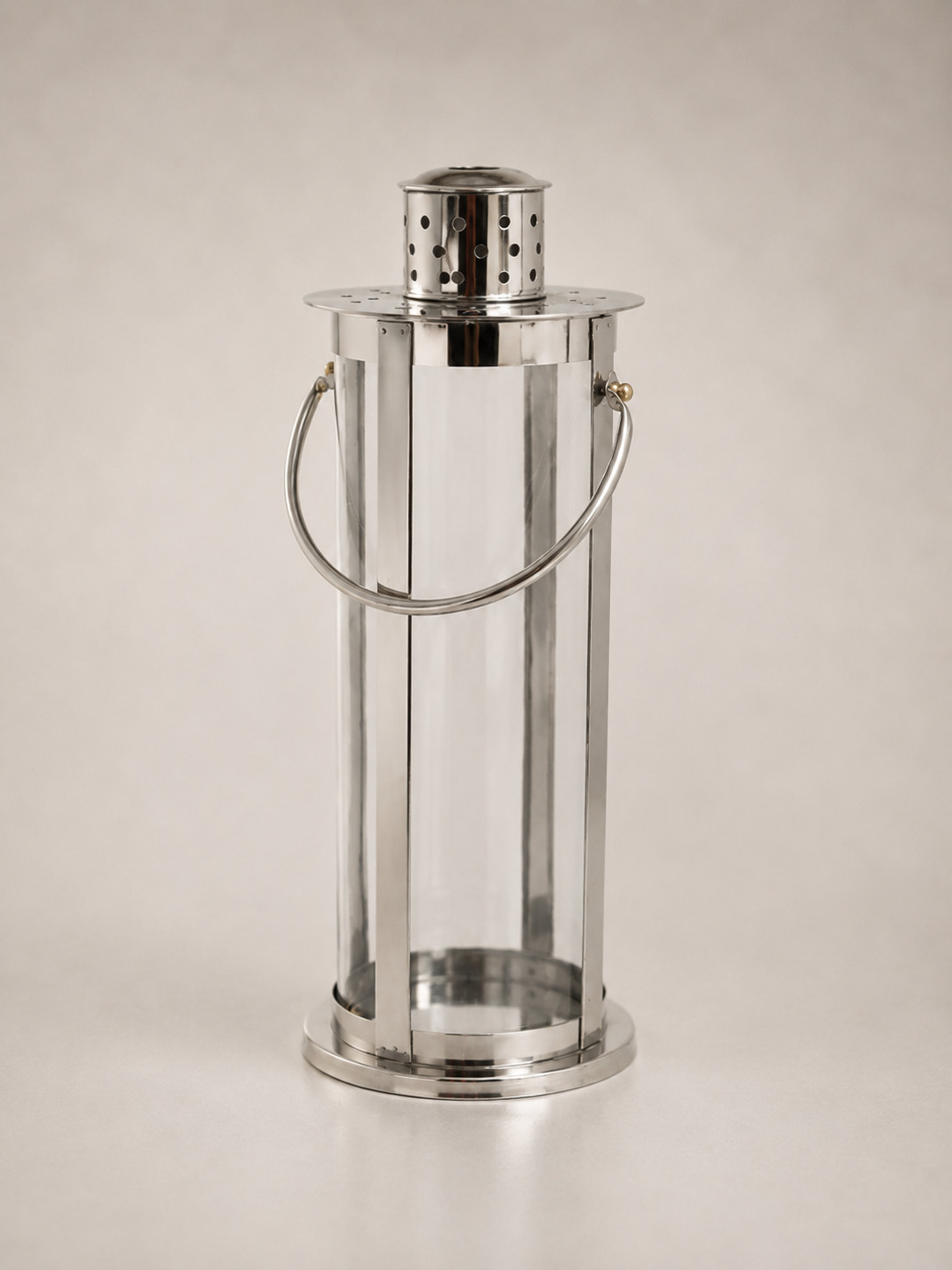 Polished metal and glass lantern
